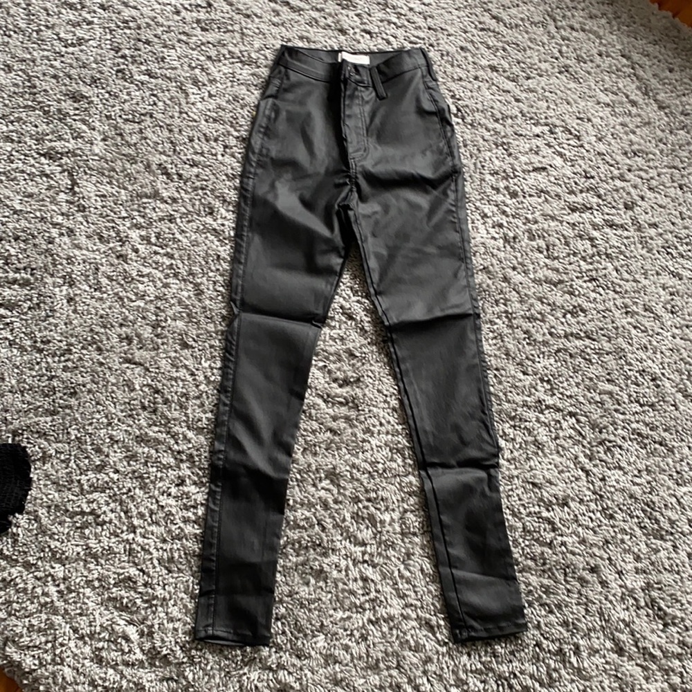 Vibrant Miu leather look jeans.